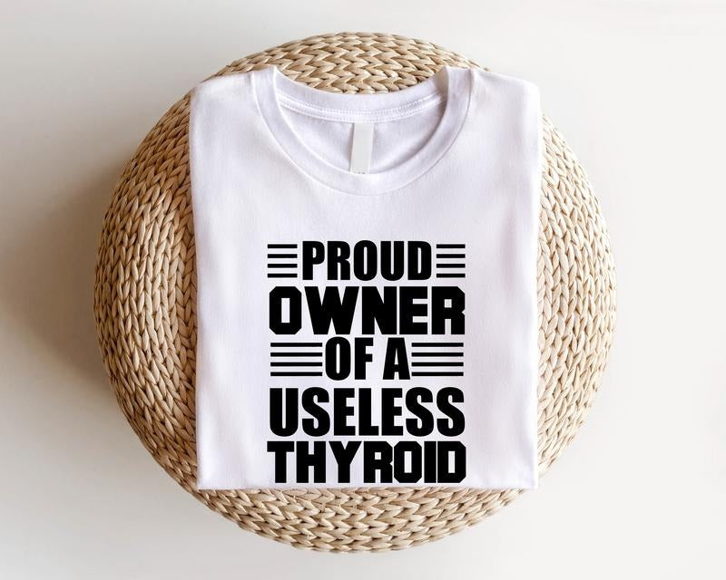 Proud Owner of a Useless Thyroid Shirt, Thyroid Disease T-shirt, Thyroid Patient Gift Short Sleeve, Hashimoto's Disease Awareness Tee, Support Tee, Thyroid Survivor Shirt, Warrior Gift Tee. Casual Round Neck